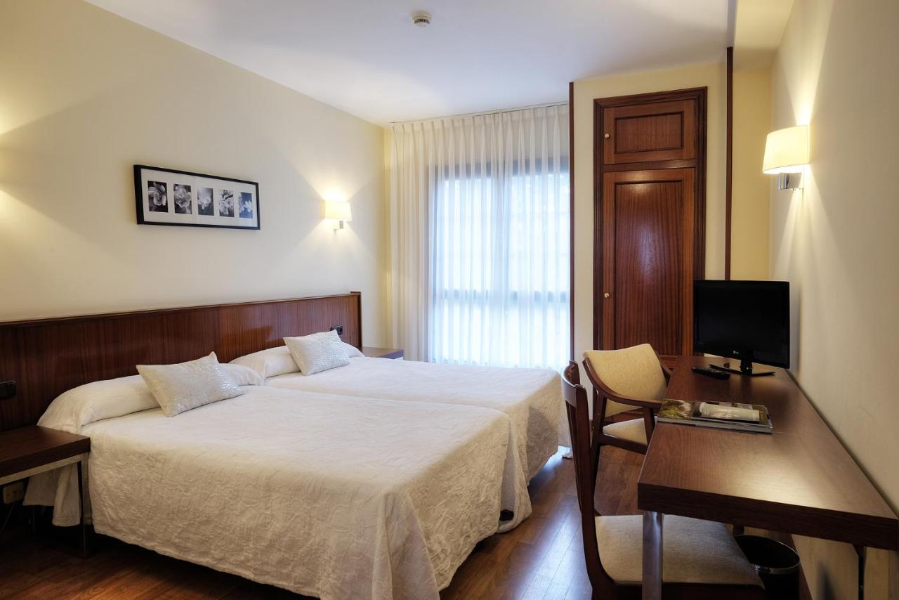 Hotel Y Apartamentos Arias Navia Kamer foto